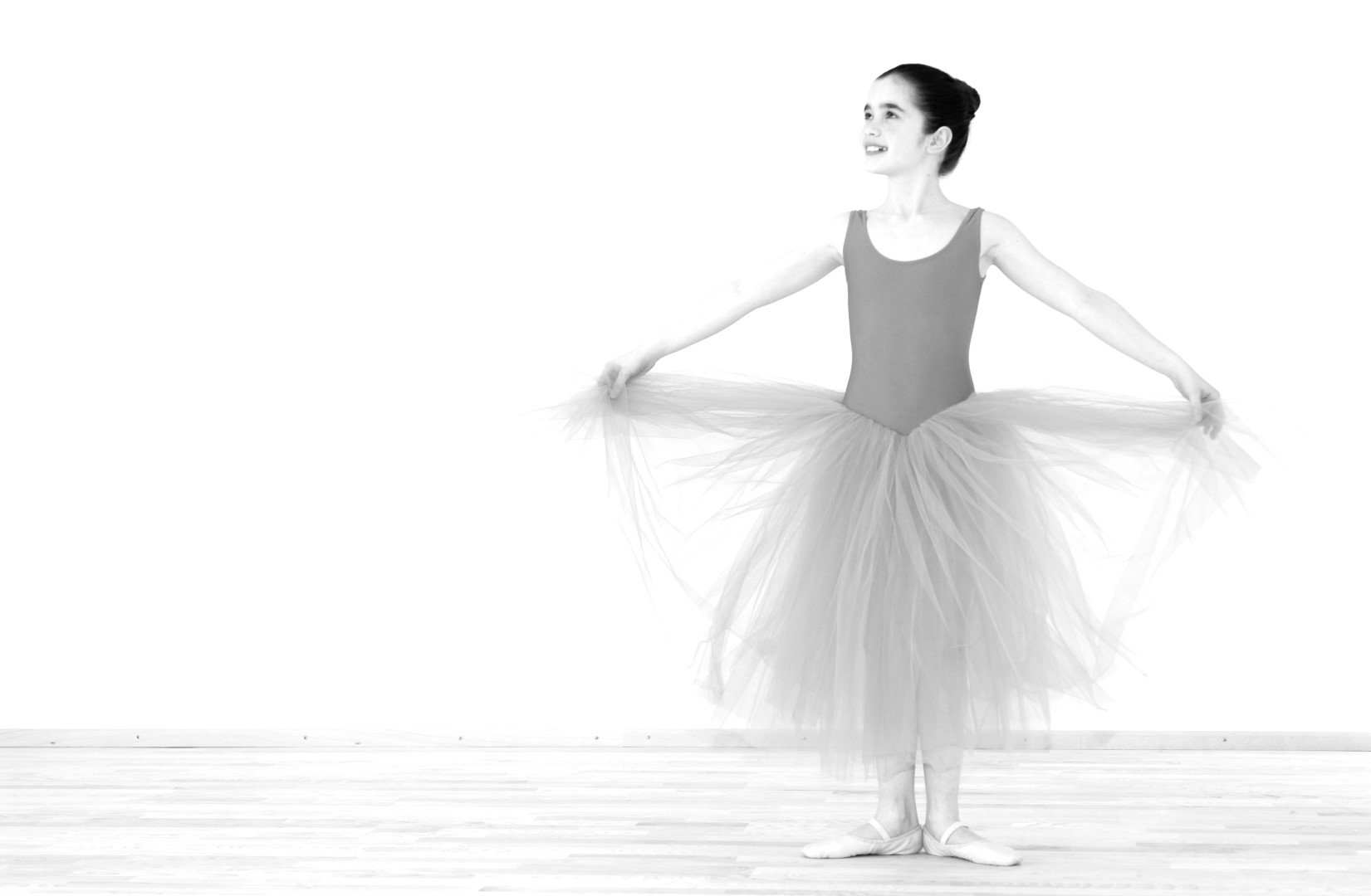 Das Bild zeigt eine junge Tänzerin