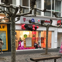 Das Bild zeigt eine Außenansicht der Geschäfts der Firma Fexcom in Siegburg